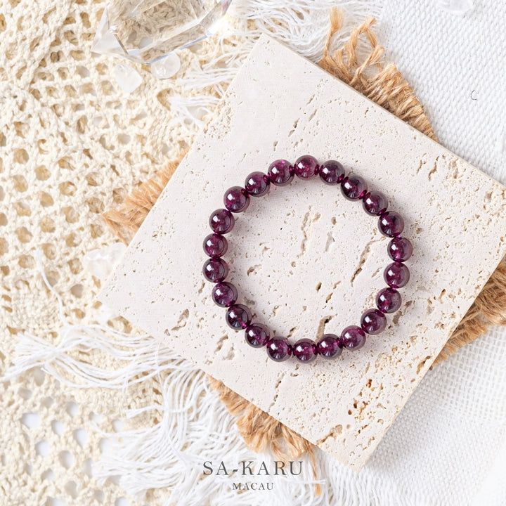 Purple tooth black garnet bracelet