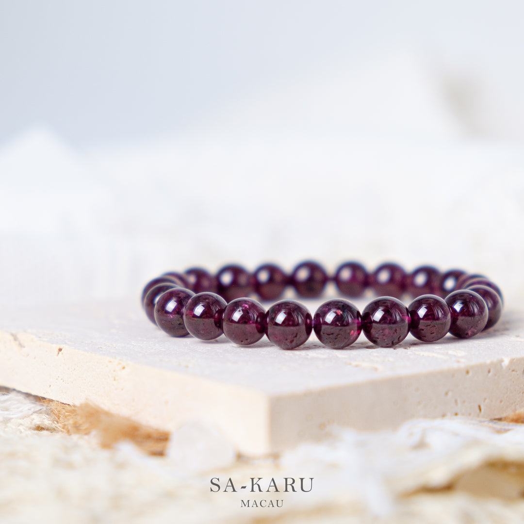 Purple tooth black garnet bracelet